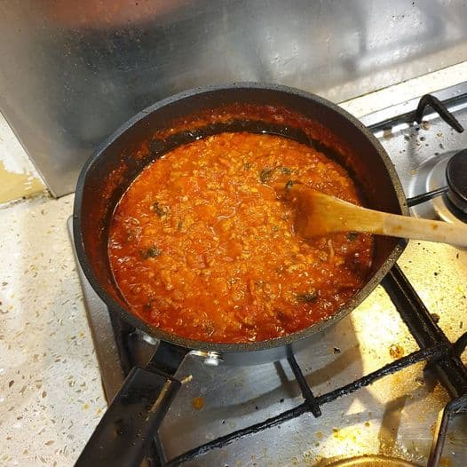 pot of bolognese sauce on the stove