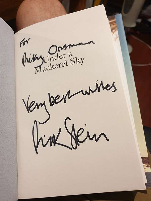 book's flyleaf signed "For Ricky Onsman,Very best wishes, Rick Stein"